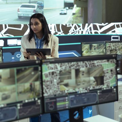 indian female manager gathers intelligence on cargo delivery logistics